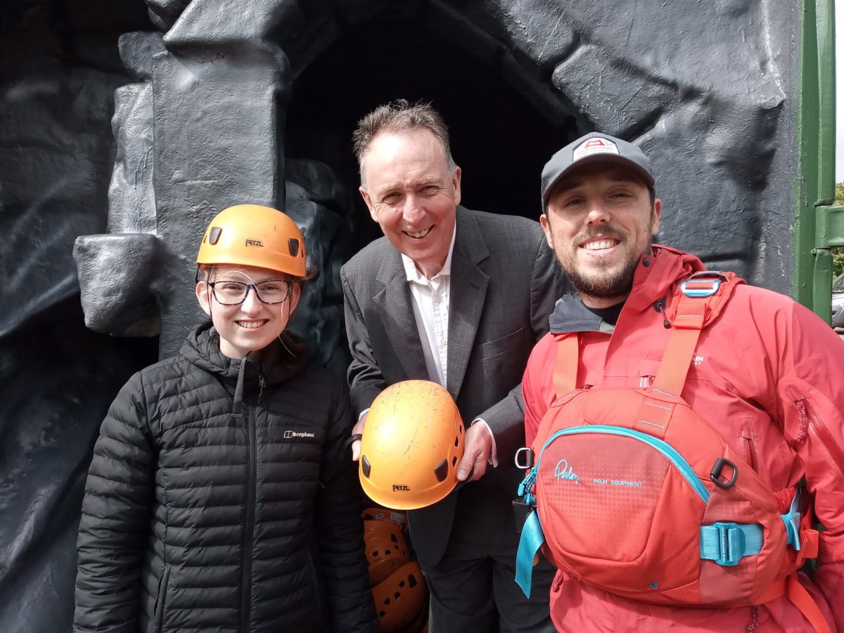 Nick Smith MP (centre) with Steve Hughes (right) Onsite Duty Manager, Skye Adventure Activity Instructor at one of the many adventure activities in Parc Bryn Bach, Tredegar.